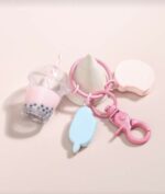 ⁦سلسلة مفاتيح على شكل الحليب الفقاعي والأيس كريم⁩ - الصورة ⁦2⁩