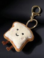 ⁦سلسلة مفاتيح فرة على شكل توست⁩ - الصورة ⁦2⁩