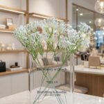 صمدية على شكل كتاب بلاستيك مقوى مع الورود